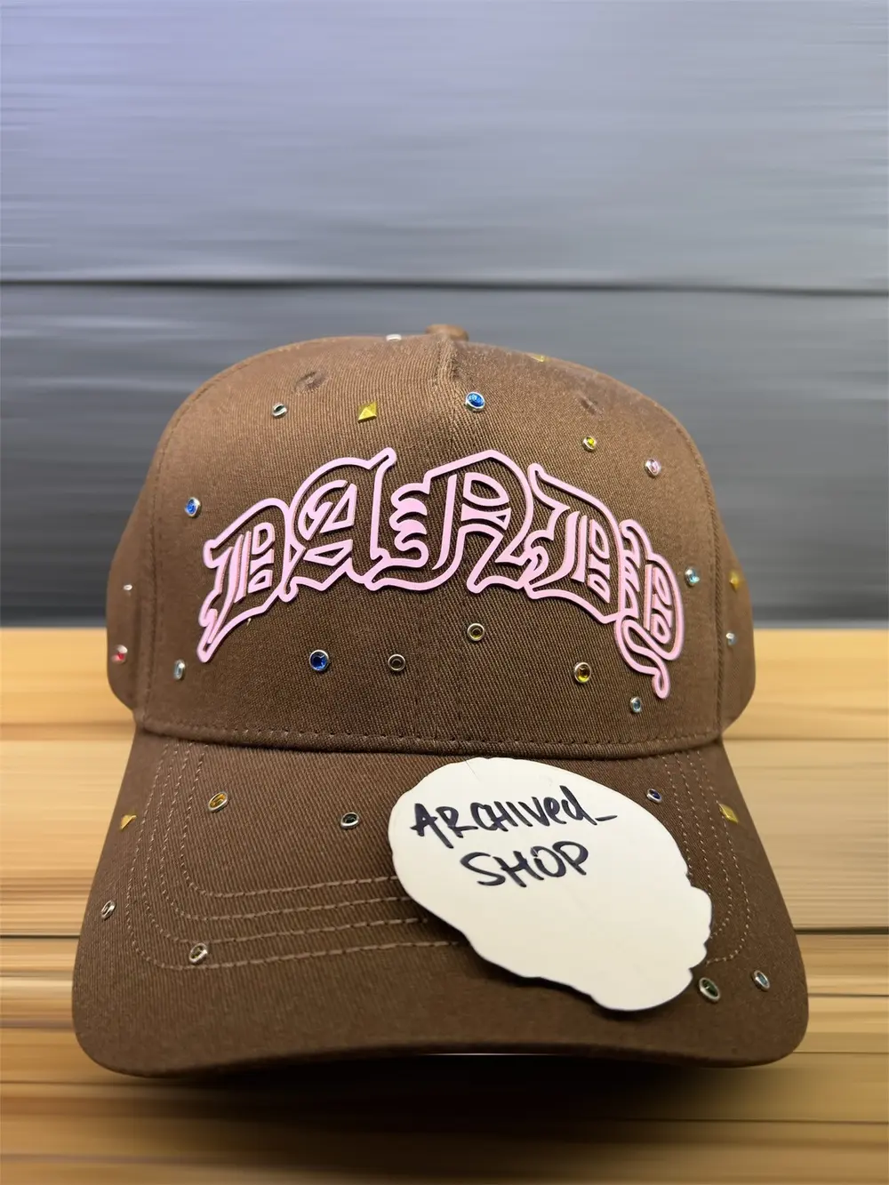 26b0640347fa48098650c9e0b1854b9c.webp DANDY HATS 10 Year Anniversary Brown / Pink Snapback - Image 1